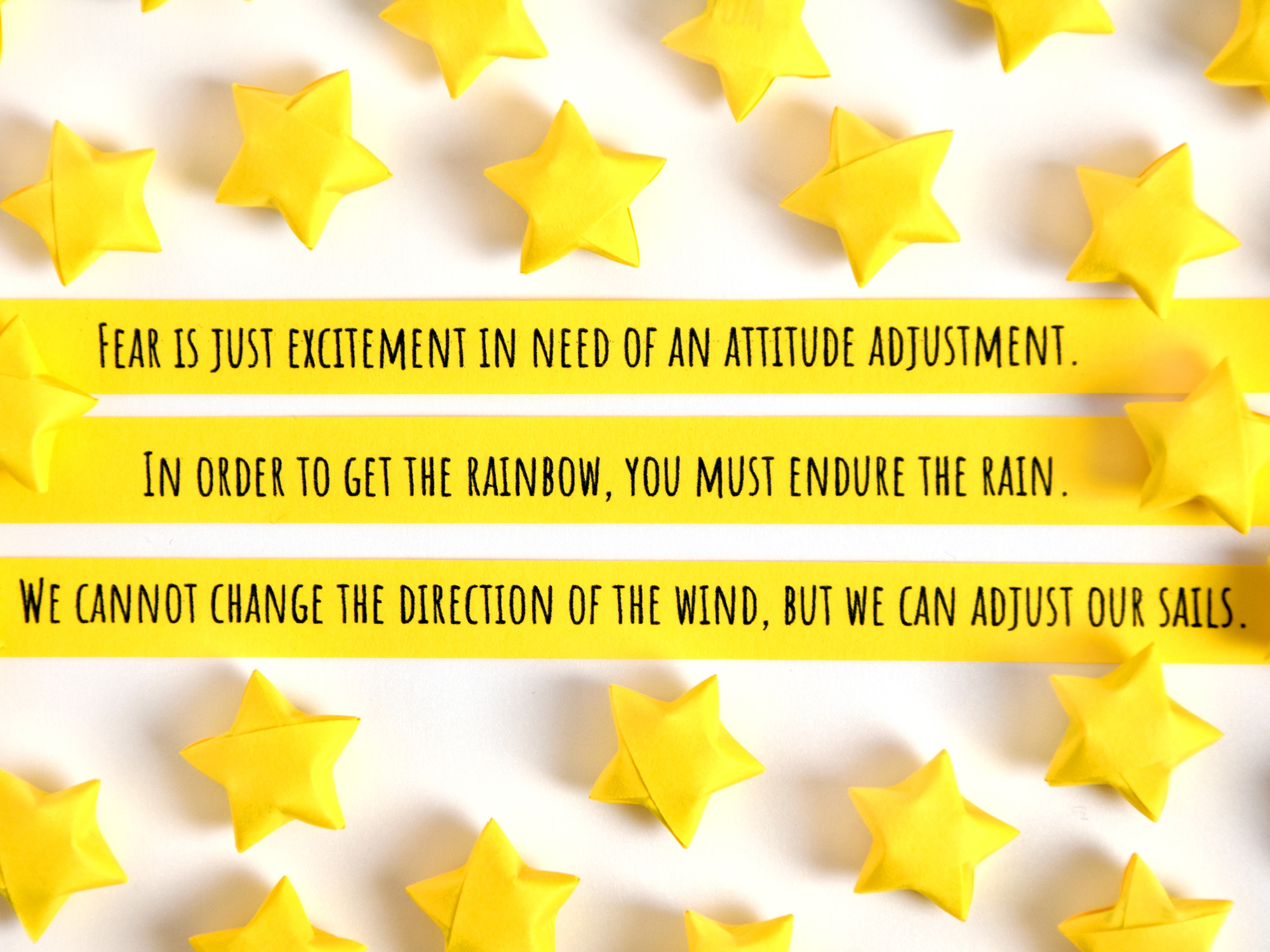 Unfolded paper star strips with quotes
